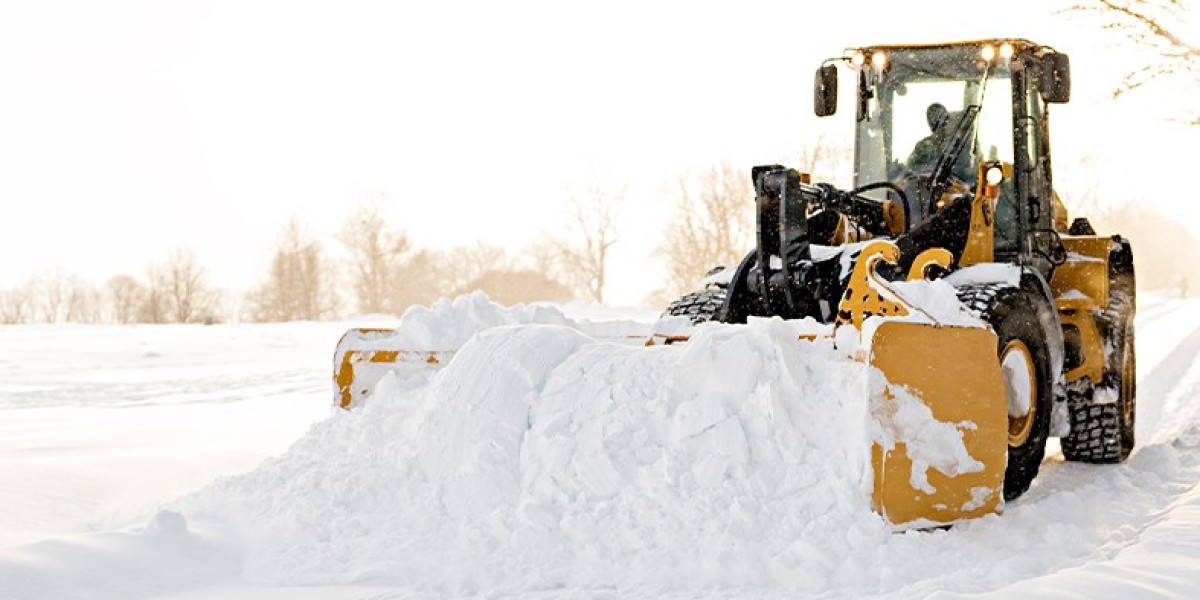 How Snow Plowing Services Help Prevent Winter Property Damage