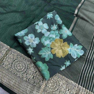 Green saree with floral patterns and gold border Profile Picture